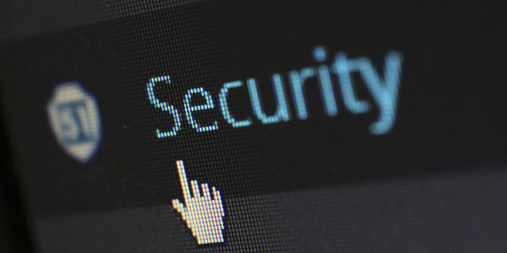 Schriftzug Security, auf dem der Mauszeiger in Form einer Hand liegt.